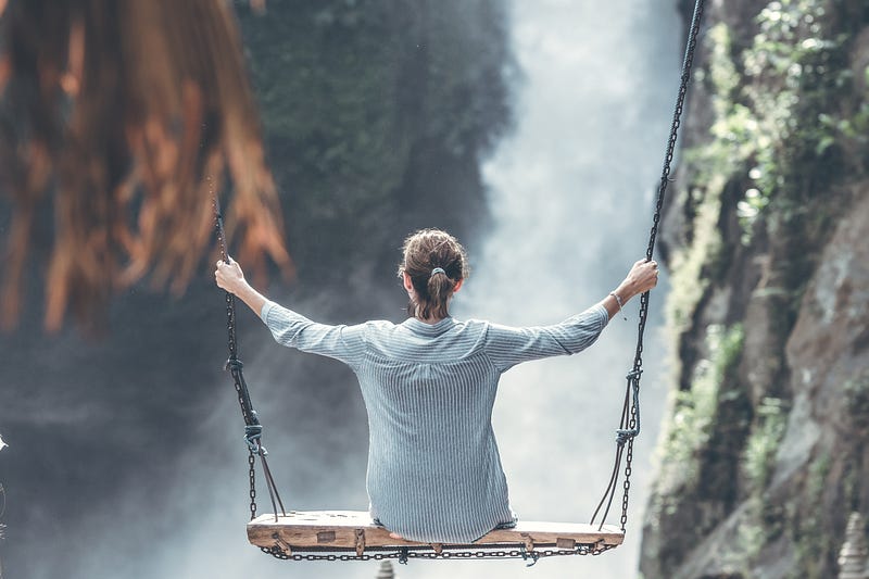 An individual meditating peacefully in nature